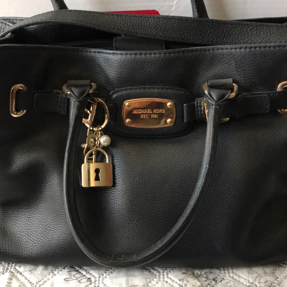 Michael Kors bag black color in good condition